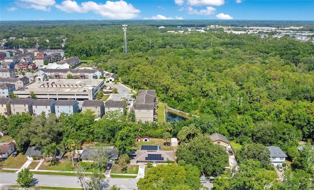 3431 Hunt Ln, Oviedo, FL 32765 - aerial overview of property's location featuring a forest and nearby suburban area