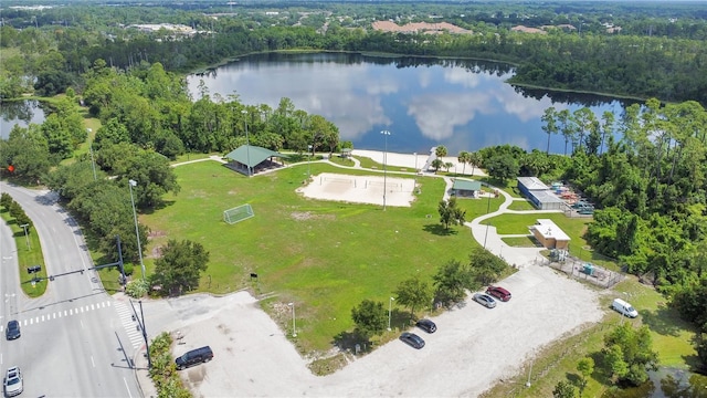 3431 Hunt Ln, Oviedo, FL 32765 - drone / aerial view of a nearby body of water and a heavily wooded area