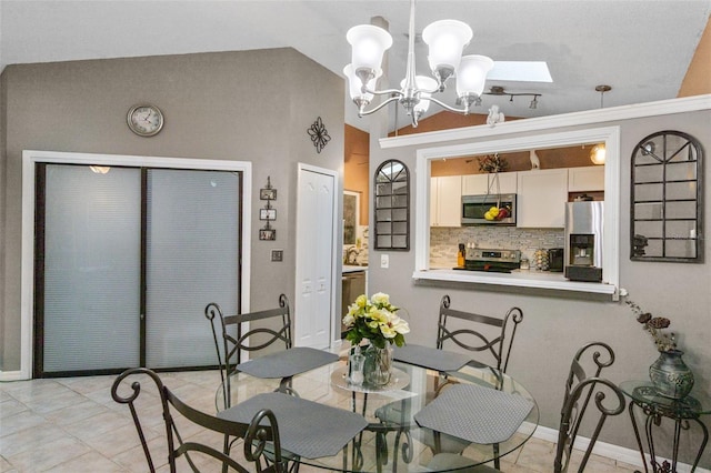 2916 Maldive Ct, Deltona, FL 32738 - dining area featuring a chandelier, baseboards, a skylight, lofted ceiling, and light tile patterned floors