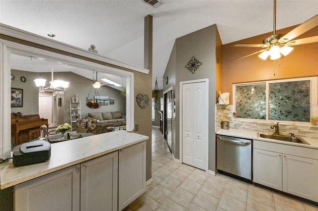 2916 Maldive Ct, Deltona, FL 32738 - kitchen featuring dishwasher, a ceiling fan, vaulted ceiling, a sink, and decorative backsplash