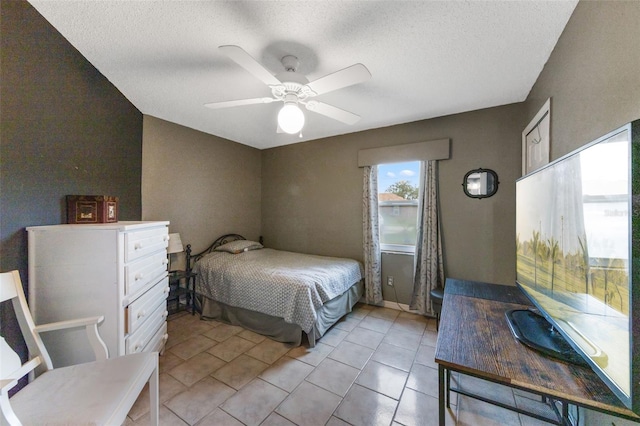 2916 Maldive Ct, Deltona, FL 32738 - bedroom featuring a textured ceiling and light tile patterned flooring