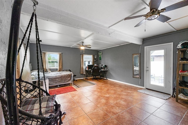 2916 Maldive Ct, Deltona, FL 32738 - bedroom with light tile patterned floors, beamed ceiling, baseboards, and a ceiling fan