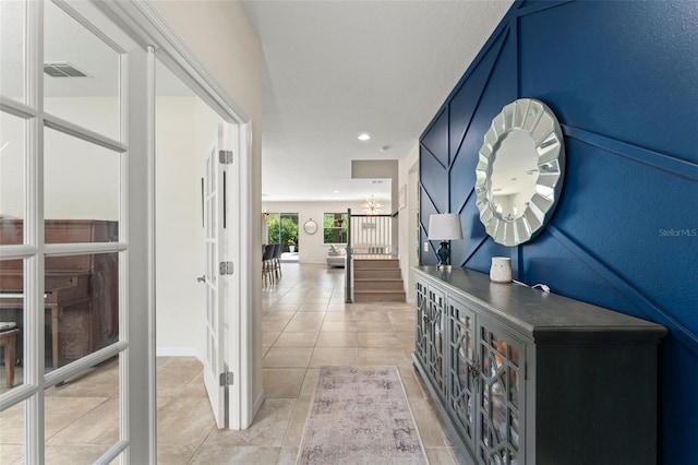 2401 Oxmoor Dr, Deland, FL 32724 - corridor with light tile patterned floors, stairway, and recessed lighting