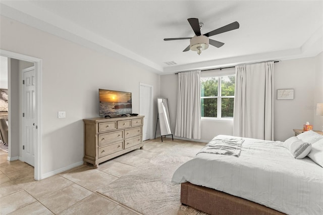 2401 Oxmoor Dr, Deland, FL 32724 - bedroom featuring light tile patterned floors, a ceiling fan, and baseboards