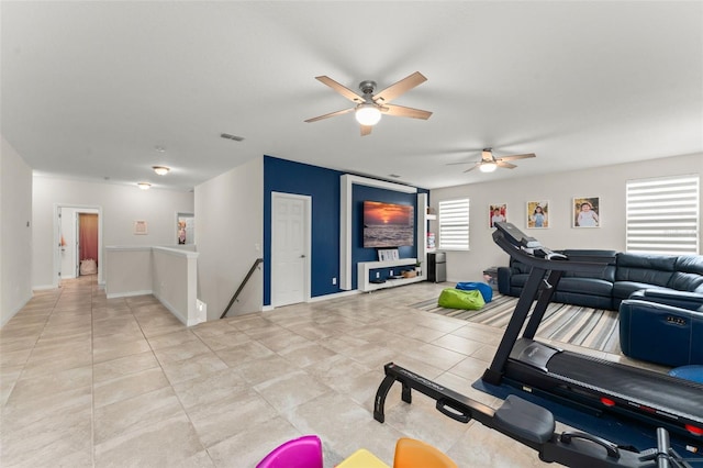 2401 Oxmoor Dr, Deland, FL 32724 - exercise area featuring ceiling fan and light tile patterned flooring
