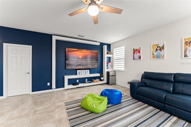 2401 Oxmoor Dr, Deland, FL 32724 - living area with ceiling fan and baseboards