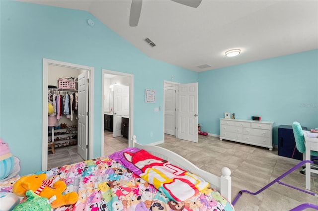 2401 Oxmoor Dr, Deland, FL 32724 - bedroom featuring lofted ceiling, a spacious closet, connected bathroom, a closet, and a ceiling fan