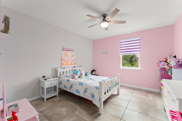 2401 Oxmoor Dr, Deland, FL 32724 - bedroom with baseboards, a ceiling fan, and light tile patterned flooring