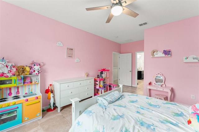 2401 Oxmoor Dr, Deland, FL 32724 - bedroom with light tile patterned floors and a ceiling fan