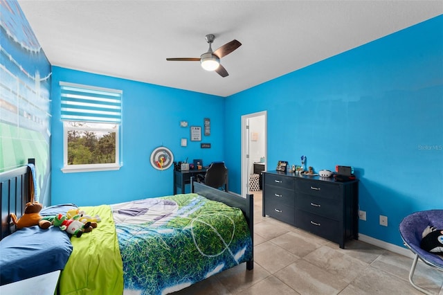 2401 Oxmoor Dr, Deland, FL 32724 - bedroom with a ceiling fan, vaulted ceiling, and baseboards