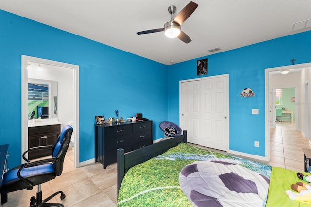2401 Oxmoor Dr, Deland, FL 32724 - bedroom featuring light tile patterned floors, a desk, a closet, ceiling fan, and baseboards