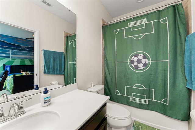 2401 Oxmoor Dr, Deland, FL 32724 - bathroom with toilet, vanity, and curtained shower
