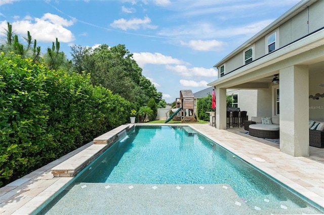 2401 Oxmoor Dr, Deland, FL 32724 - swimming pool with a playground, a patio, and ceiling fan