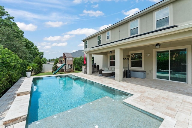 2401 Oxmoor Dr, Deland, FL 32724 - view of swimming pool with ceiling fan, a playground, and a patio