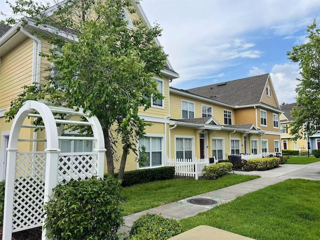4010 Santa Maria Dr Unit 106, Kissimmee, FL 34741 - view of front of house featuring a front yard