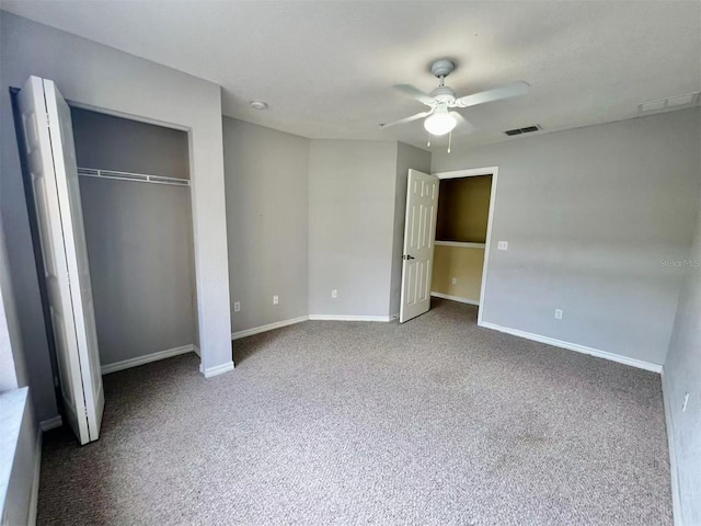 4010 Santa Maria Dr Unit 106, Kissimmee, FL 34741 - unfurnished bedroom featuring carpet floors, baseboards, a closet, and a ceiling fan