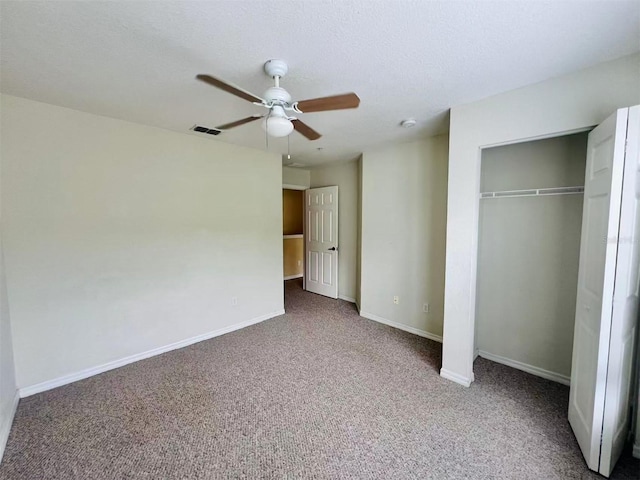 4010 Santa Maria Dr Unit 106, Kissimmee, FL 34741 - unfurnished bedroom featuring carpet, baseboards, a closet, and ceiling fan
