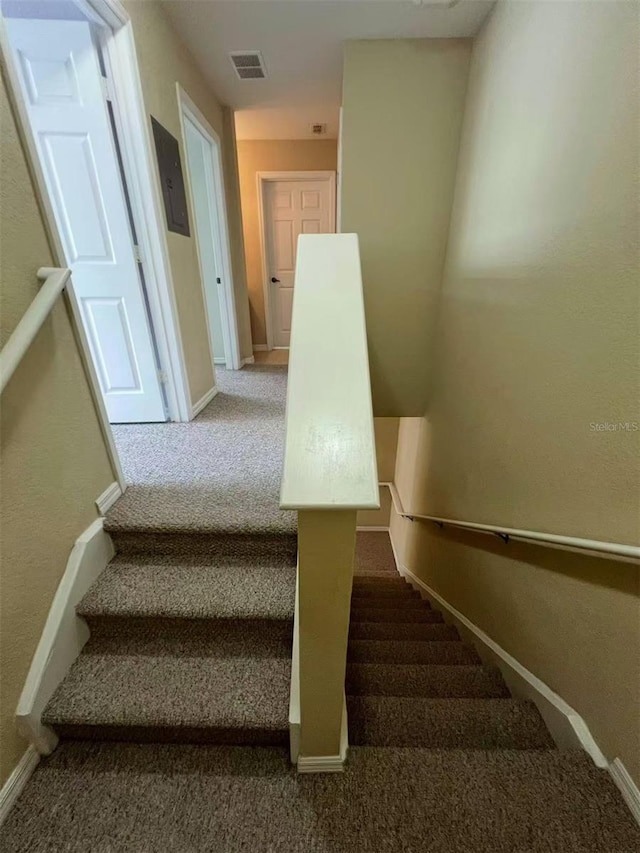 4010 Santa Maria Dr Unit 106, Kissimmee, FL 34741 - staircase featuring carpet and baseboards