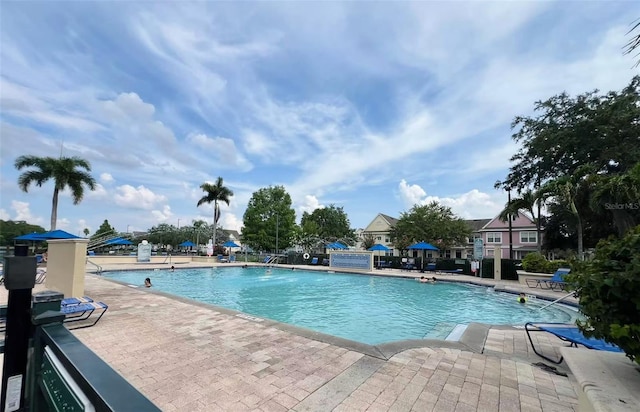 4010 Santa Maria Dr Unit 106, Kissimmee, FL 34741 - community pool featuring a patio area
