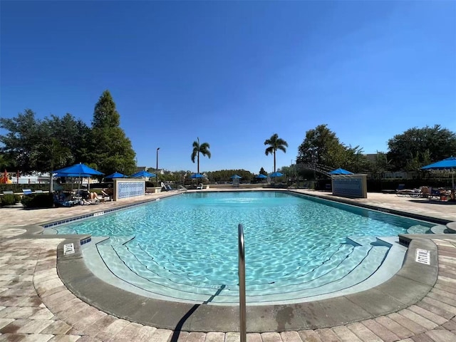 4010 Santa Maria Dr Unit 106, Kissimmee, FL 34741 - community pool with a patio