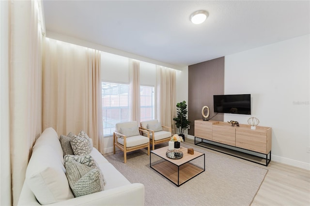 2923 Banana Palm Dr, Kissimmee, FL 34747 - living area featuring baseboards and wood finished floors