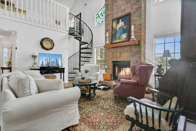 3501 Danby Ct, Orlando, FL 32812 - living room with a high ceiling, stairs, healthy amount of natural light, and a brick fireplace