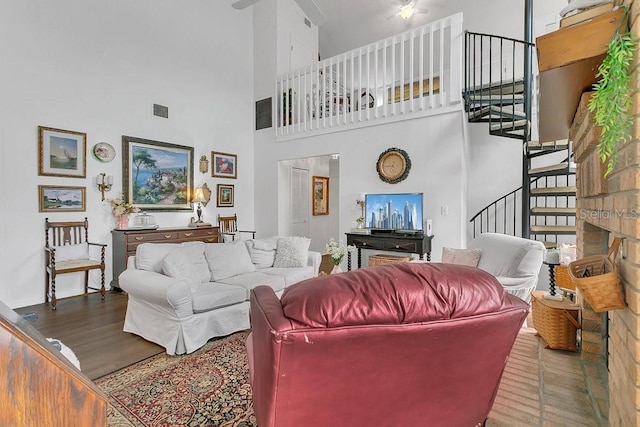 3501 Danby Ct, Orlando, FL 32812 - living area with stairs, wood finished floors, a towering ceiling, and ceiling fan