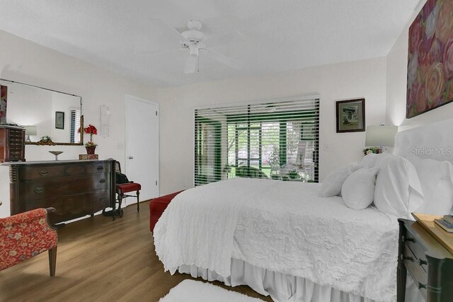 3501 Danby Ct, Orlando, FL 32812 - bedroom with wood finished floors and ceiling fan