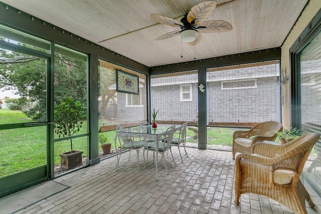 3501 Danby Ct, Orlando, FL 32812 - sunroom featuring ceiling fan and outdoor dining area