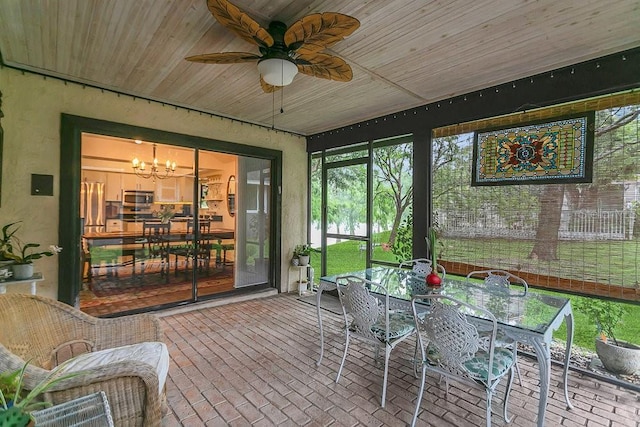 3501 Danby Ct, Orlando, FL 32812 - sunroom / solarium with ceiling fan, a chandelier, and outdoor dining area