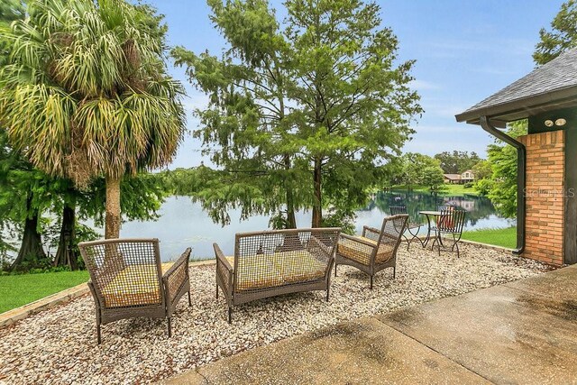 3501 Danby Ct, Orlando, FL 32812 - view of patio with a water view
