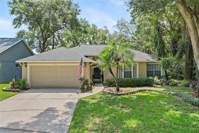 1354 Dutch Elm Dr, Altamonte Springs, FL 32714 - single story home featuring an attached garage, stucco siding, driveway, and a front yard