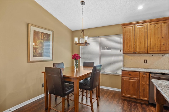 1354 Dutch Elm Dr, Altamonte Springs, FL 32714 - dining room featuring dark wood-style flooring, baseboards, lofted ceiling, and a textured ceiling