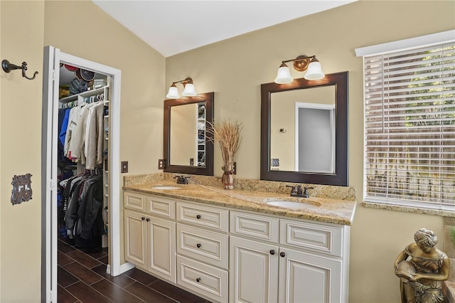 1354 Dutch Elm Dr, Altamonte Springs, FL 32714 - full bath featuring double vanity, a spacious closet, and wood finished floors