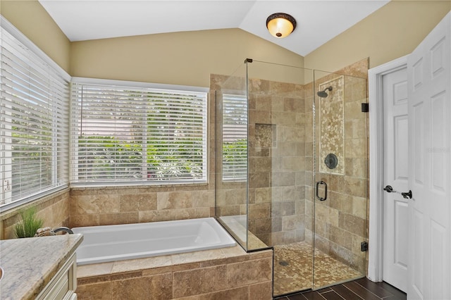 1354 Dutch Elm Dr, Altamonte Springs, FL 32714 - full bathroom featuring a garden tub, a shower stall, lofted ceiling, and vanity