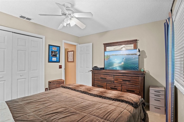 1354 Dutch Elm Dr, Altamonte Springs, FL 32714 - bedroom featuring a closet, a textured ceiling, and ceiling fan