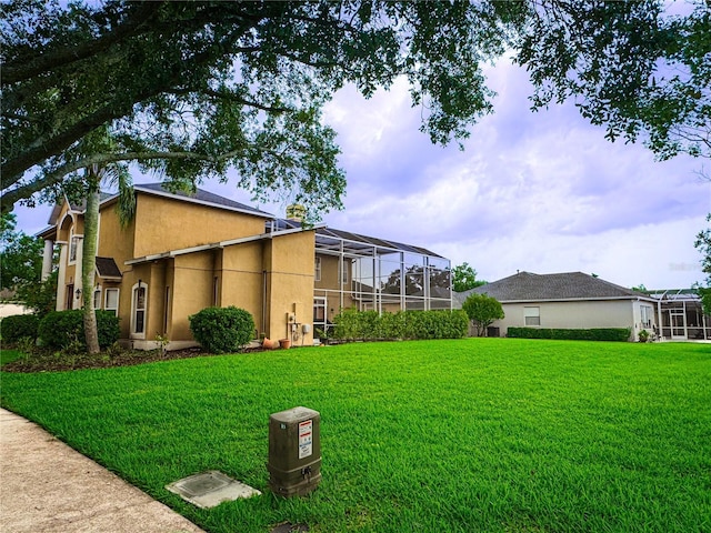 357 Fairway Pointe Cir, Orlando, FL 32828 - view of green lawn featuring glass enclosure