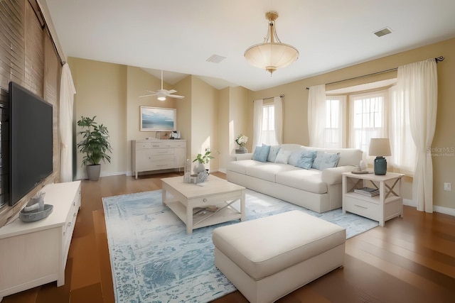 357 Fairway Pointe Cir, Orlando, FL 32828 - living room with light wood-style floors, baseboards, and a ceiling fan