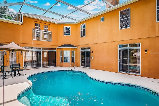357 Fairway Pointe Cir, Orlando, FL 32828 - outdoor pool featuring a patio area and a lanai
