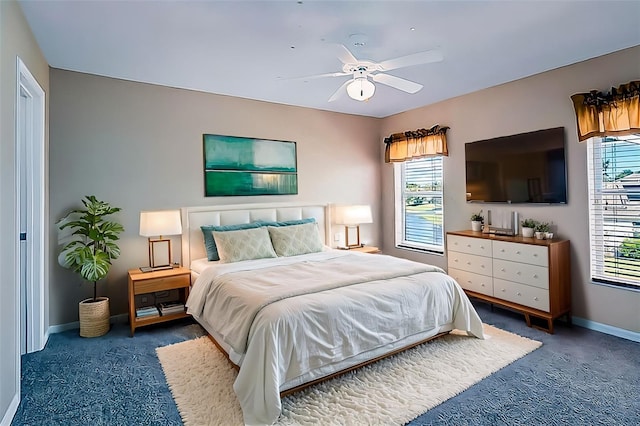357 Fairway Pointe Cir, Orlando, FL 32828 - carpeted bedroom with baseboards and ceiling fan