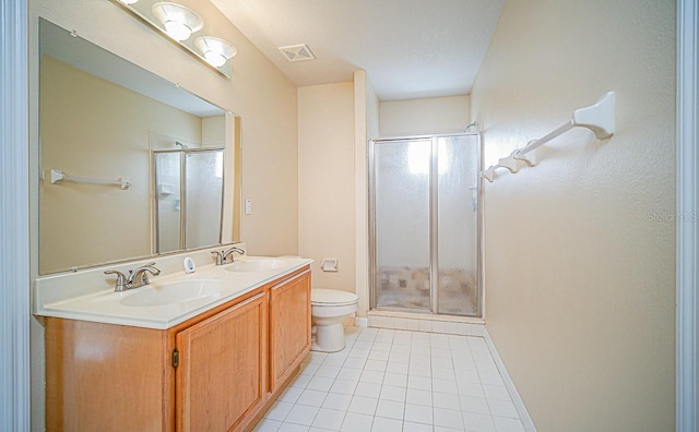 357 Fairway Pointe Cir, Orlando, FL 32828 - bathroom featuring tile patterned flooring, a stall shower, and double vanity