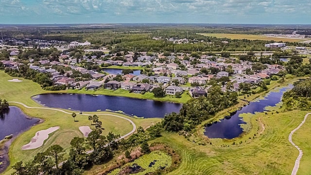 357 Fairway Pointe Cir, Orlando, FL 32828 - aerial view of property's location with nearby suburban area, a golf course, and a large body of water