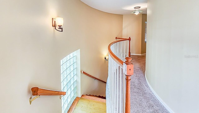 357 Fairway Pointe Cir, Orlando, FL 32828 - staircase with baseboards and carpet floors