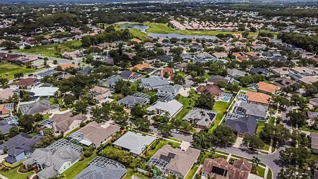 357 Fairway Pointe Cir, Orlando, FL 32828 - aerial overview of property's location with a nearby body of water and nearby suburban area