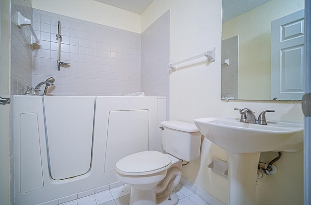 357 Fairway Pointe Cir, Orlando, FL 32828 - bathroom featuring tile patterned flooring and toilet