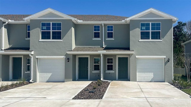 6607 Leo Ln, Saint Cloud, FL 34773 - traditional home with stucco siding, a garage, and driveway