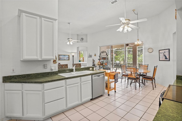 468 Alinole Loop, Lake Mary, FL 32746 - kitchen with appliances with stainless steel finishes, a ceiling fan, high vaulted ceiling, a sink, and dark countertops