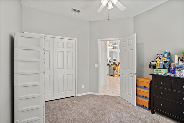 468 Alinole Loop, Lake Mary, FL 32746 - bedroom featuring light colored carpet, a closet, light tile patterned floors, and ceiling fan