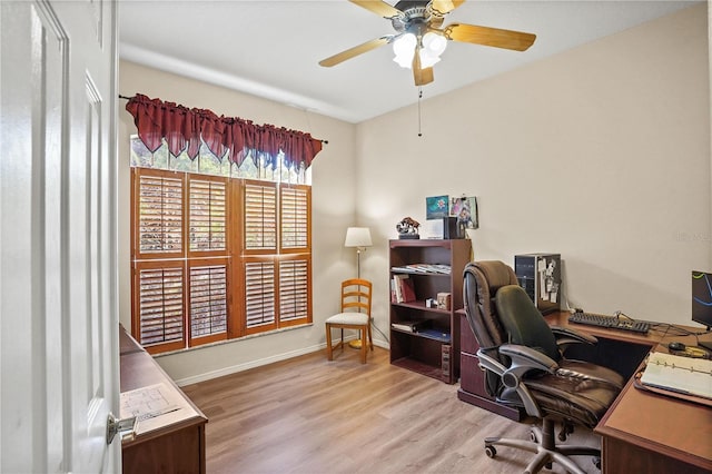 468 Alinole Loop, Lake Mary, FL 32746 - home office featuring wood finished floors, a ceiling fan, and baseboards