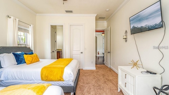 7411 Excitement Dr, Reunion, FL 34747 - bedroom featuring crown molding, light carpet, baseboards, and ensuite bath